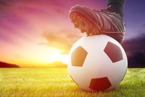 Football Or Soccer Ball At The Kickoff Of A Game